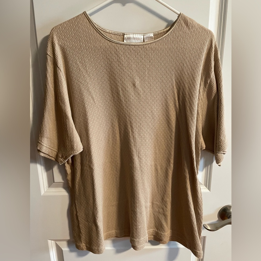 Woman’s Christie and Jill short sleeve gold shirt